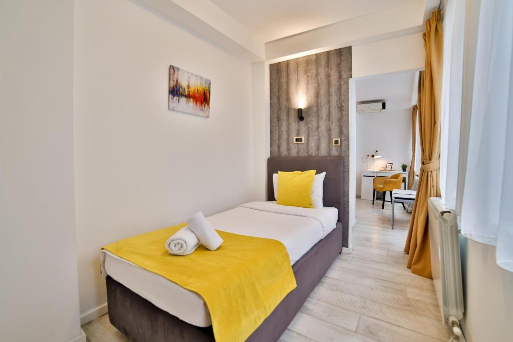 Postel nebo postele na pokoji v ubytování Garni House 46 Plus