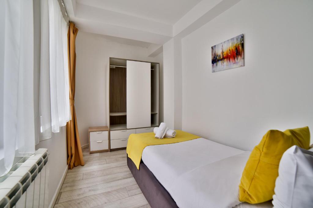 Postel nebo postele na pokoji v ubytování Garni House 46 Plus