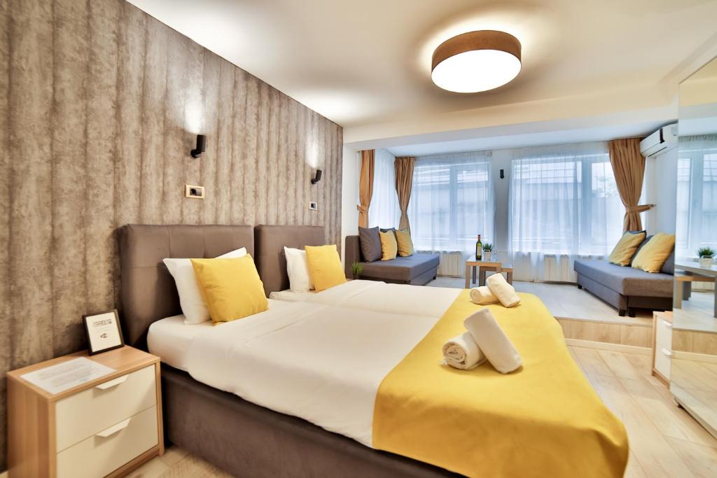 Postel nebo postele na pokoji v ubytování Garni House 46 Plus