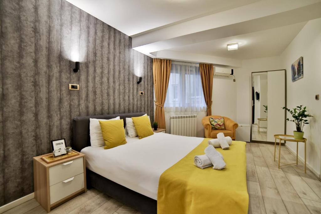 Postel nebo postele na pokoji v ubytování Garni House 46 Plus