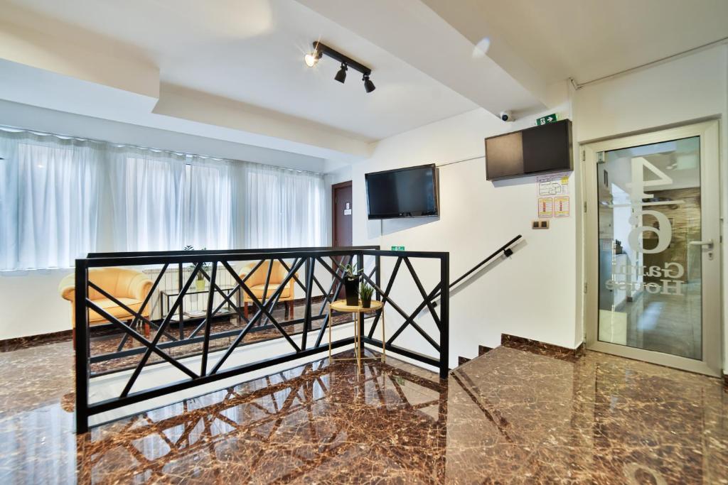 TV a/nebo společenská místnost v ubytování Garni House 46 Plus