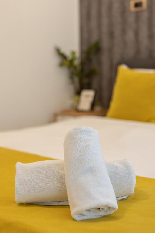 Postel nebo postele na pokoji v ubytování Garni House 46 Plus