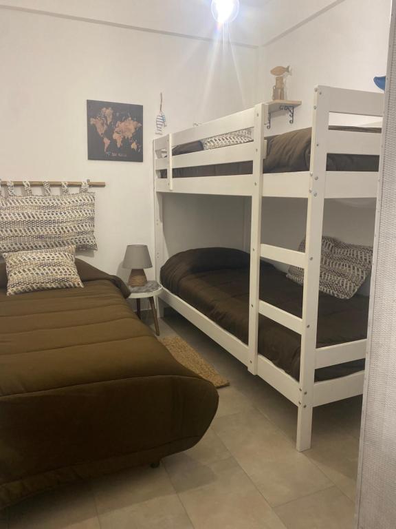Postel nebo postele na pokoji v ubytování Cala Holidays vicino Aeroporto&Mare