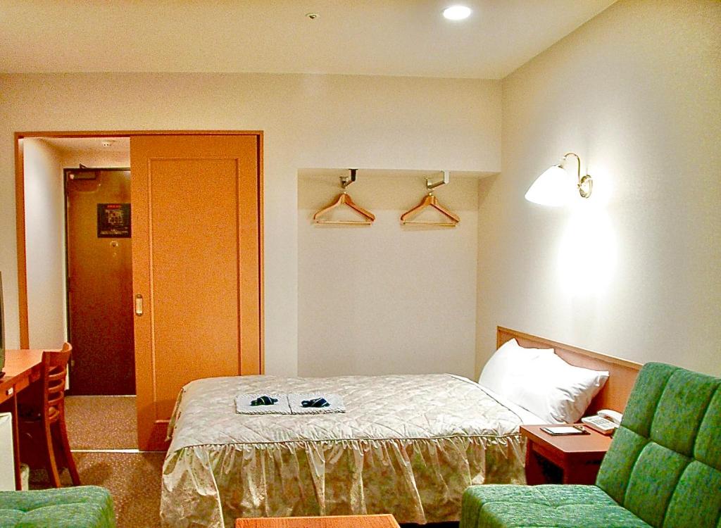 Posezení v ubytování Himeji Ekimae Universal Hotel Minamiguchi