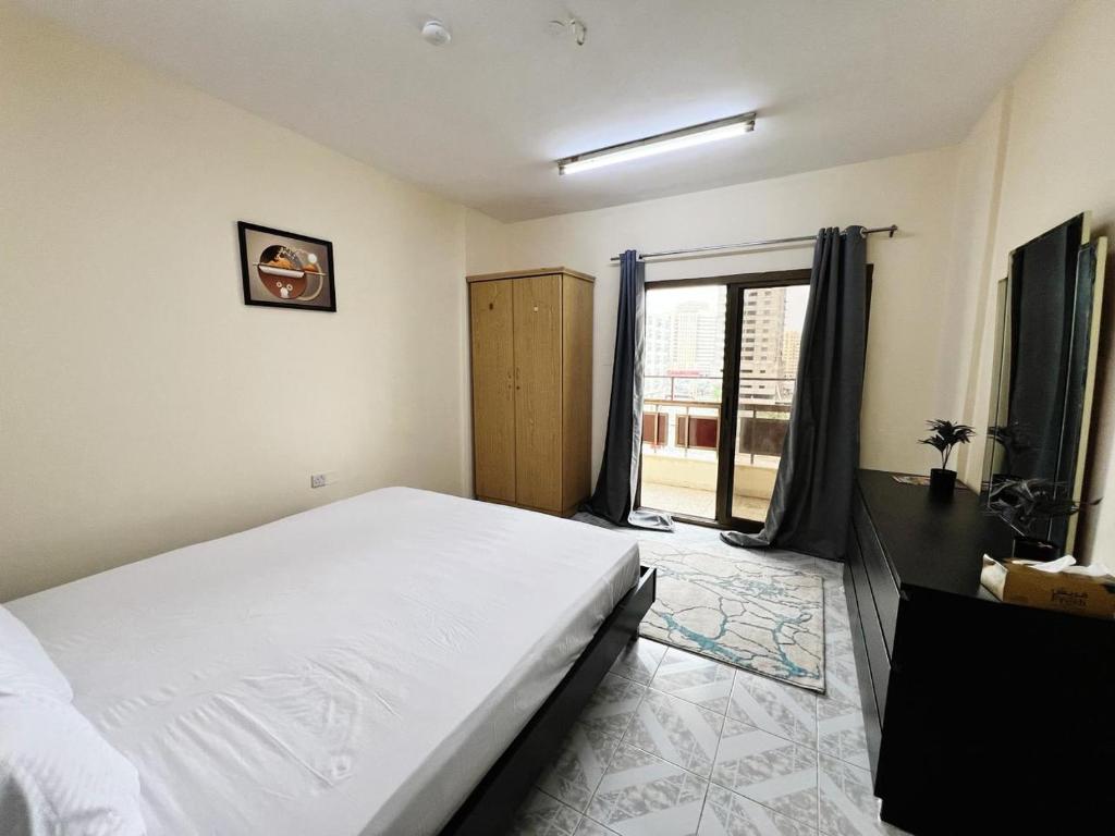 Postel nebo postele na pokoji v ubytování Sam Home