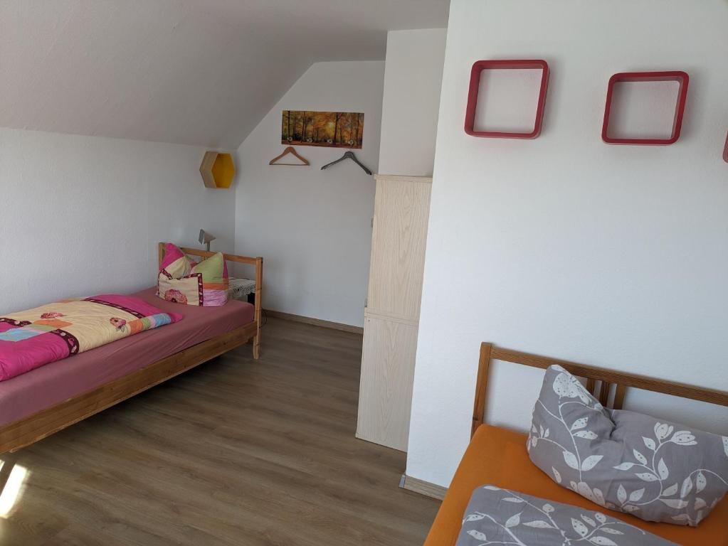 Postel nebo postele na pokoji v ubytování Lippetaler Gästehaus