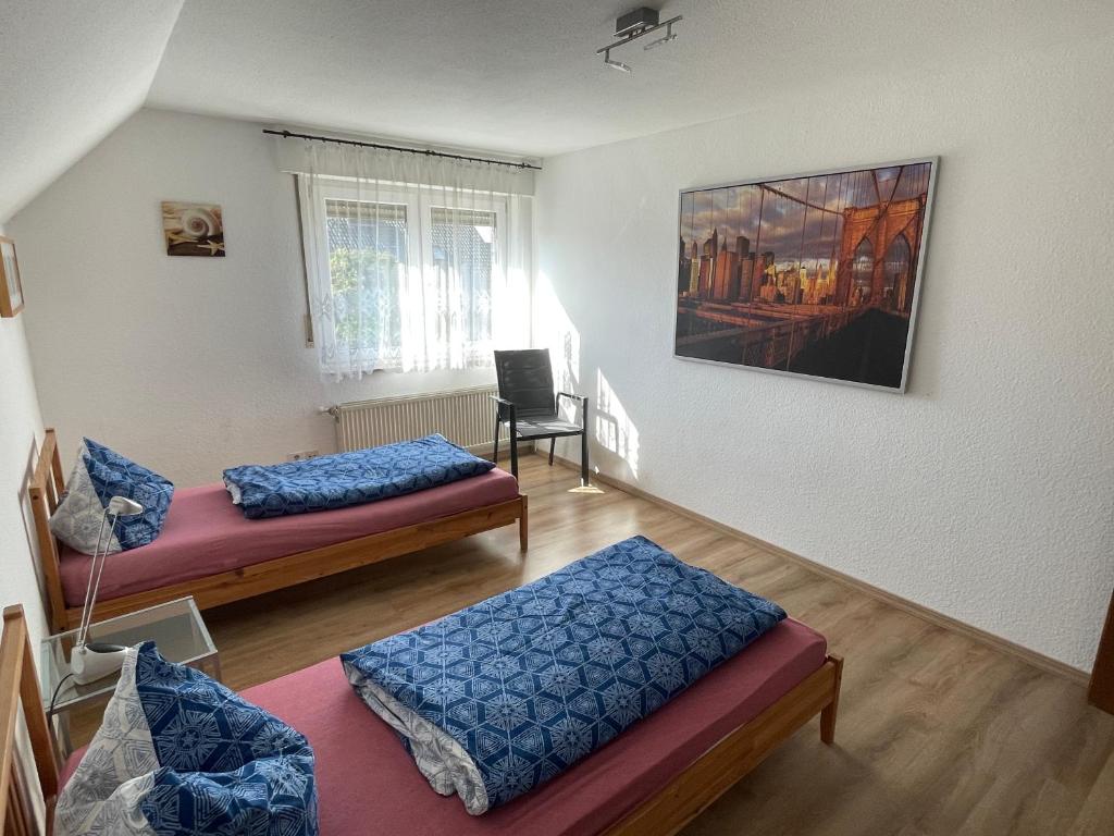 Postel nebo postele na pokoji v ubytování Lippetaler Gästehaus