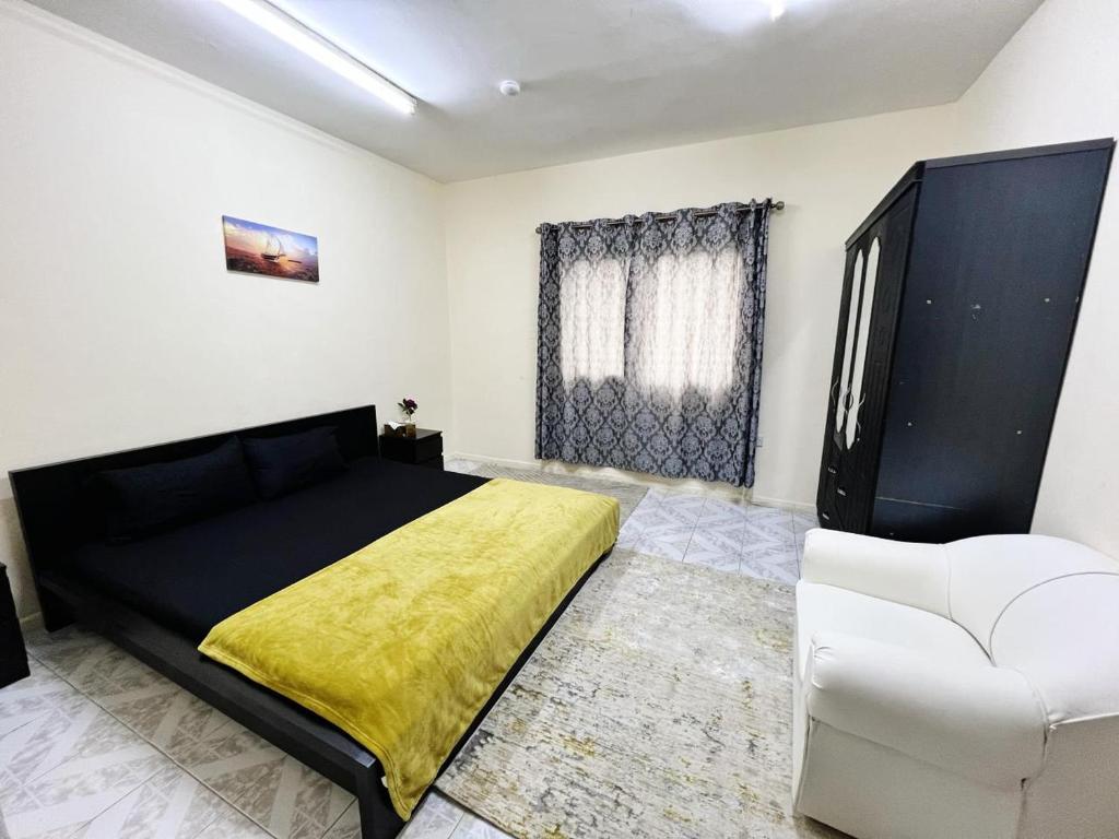 Postel nebo postele na pokoji v ubytování Sam Home