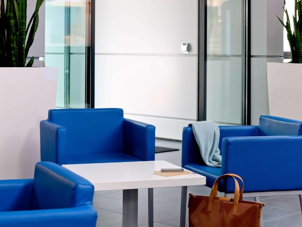Zona de estar de Ibis Budget Madrid Vallecas
