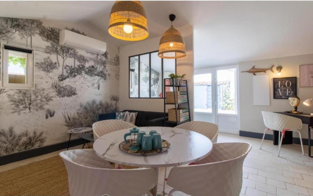 Photo de la galerie de l'établissement La Maison d'Odile, à Grand-Village-Plage