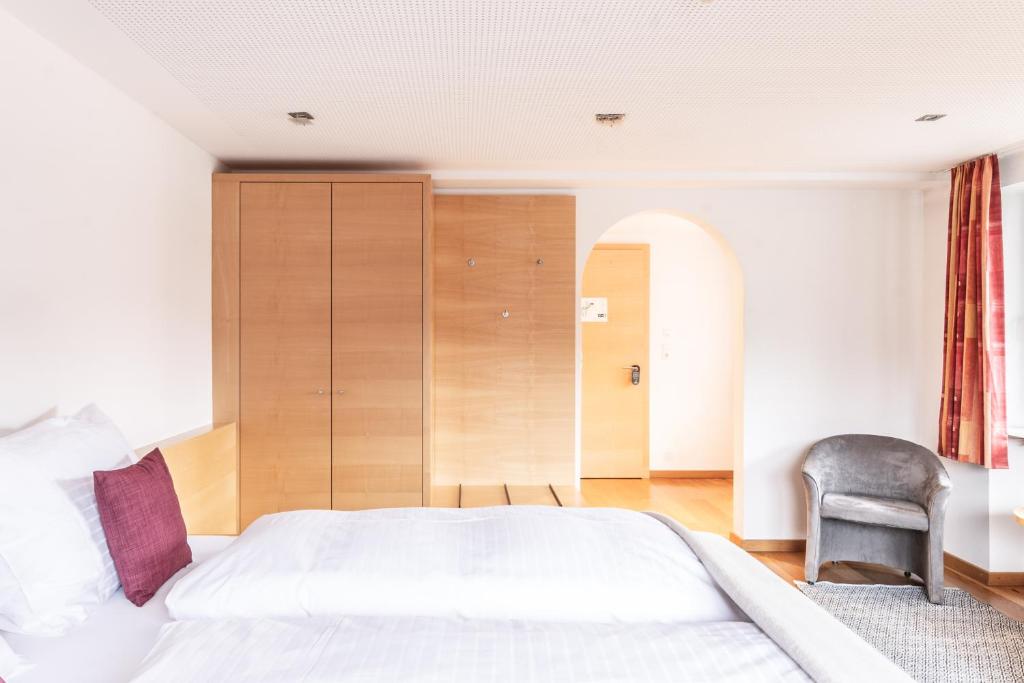 Postel nebo postele na pokoji v ubytování Hotel Löwen