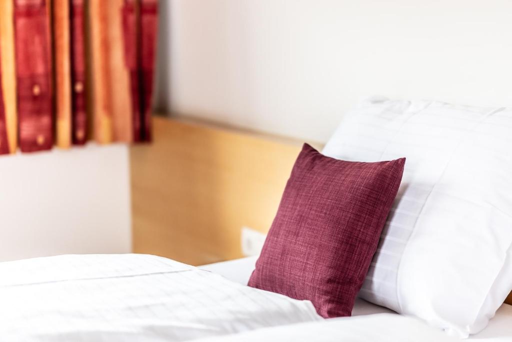 Postel nebo postele na pokoji v ubytování Hotel Löwen