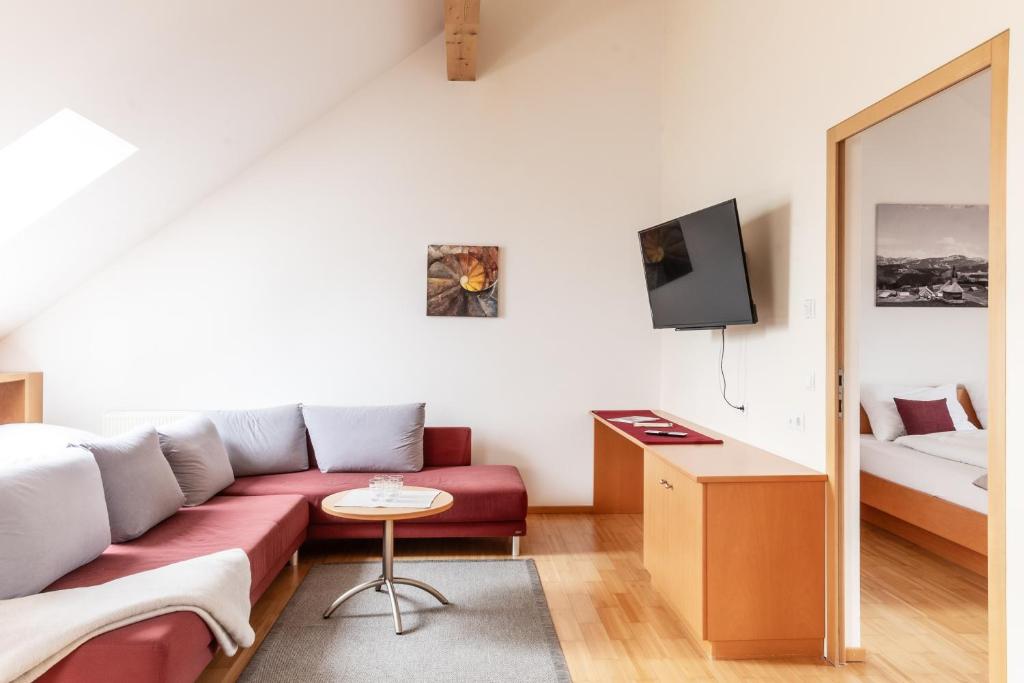 TV a/nebo společenská místnost v ubytování Hotel Löwen