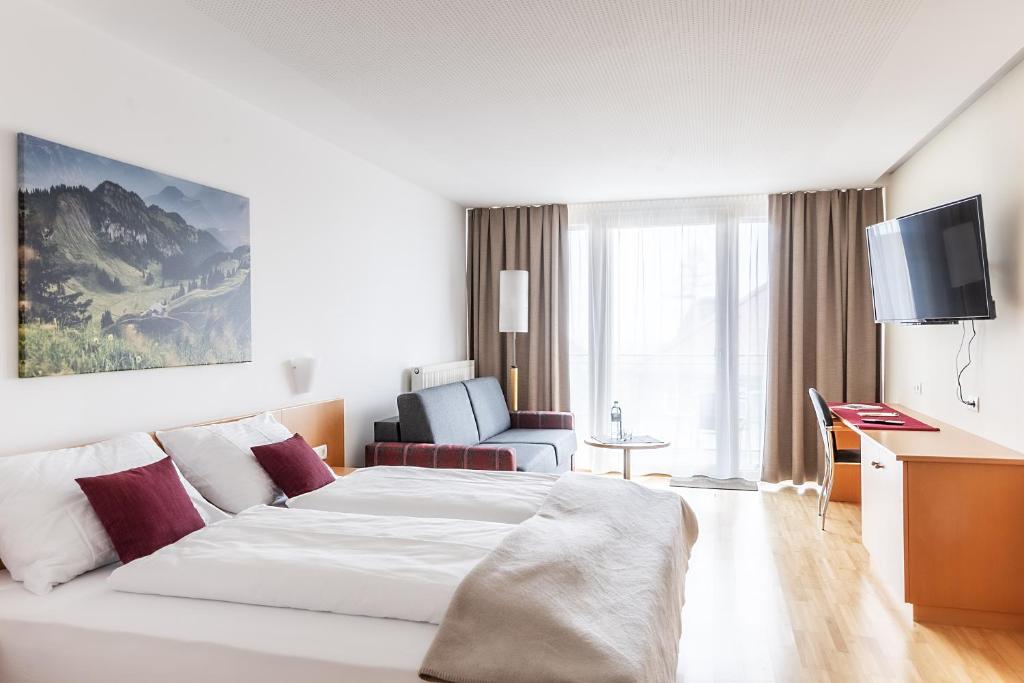 Postel nebo postele na pokoji v ubytování Hotel Löwen