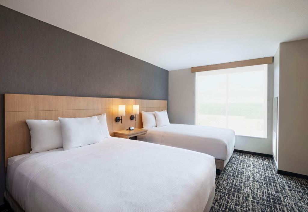 Postel nebo postele na pokoji v ubytování Hyatt Place Austin Lake Travis/Four Points