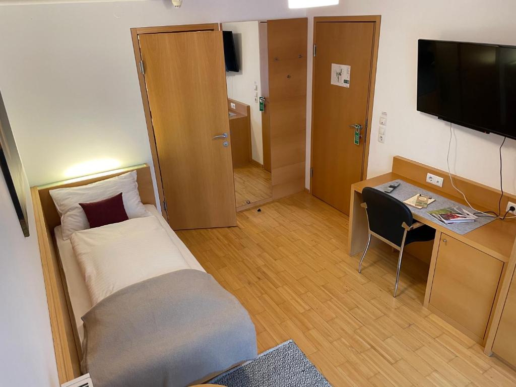 TV a/nebo společenská místnost v ubytování Hotel Löwen