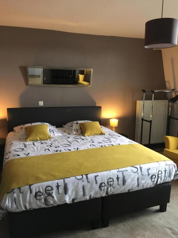 Postel nebo postele na pokoji v ubytování B&B De Kaai