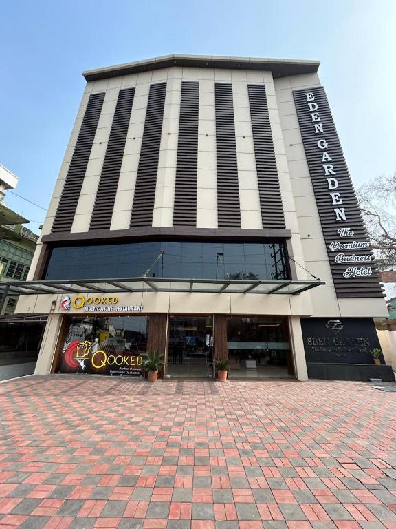 a building with a sign on the front of it at HOTEL EDEN GARDEN in Āsansol