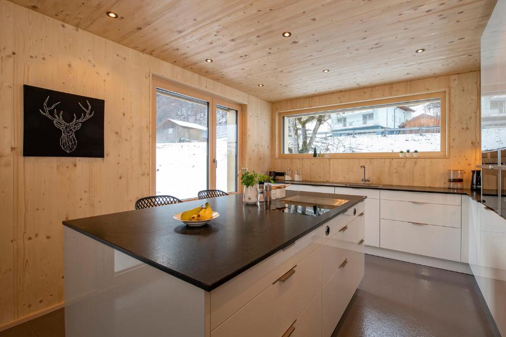Kuchyň nebo kuchyňský kout v ubytování Haus Valtellina