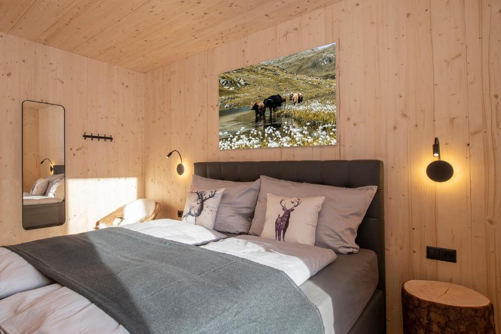 Postel nebo postele na pokoji v ubytování Haus Valtellina