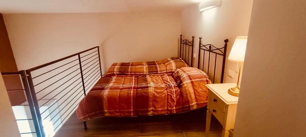 Postel nebo postele na pokoji v ubytování Tormalina rosa presso La Bordona