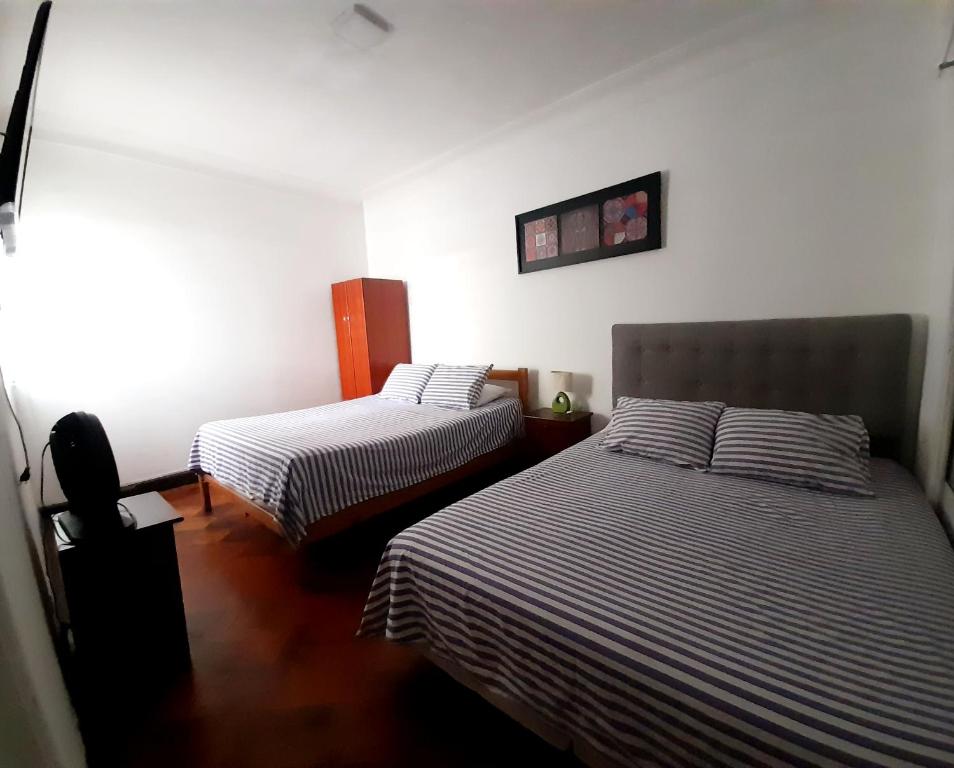 Postel nebo postele na pokoji v ubytování Atacama Hostel Backpackers