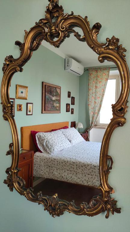Postel nebo postele na pokoji v ubytování Ai 4 Gelsi B&B