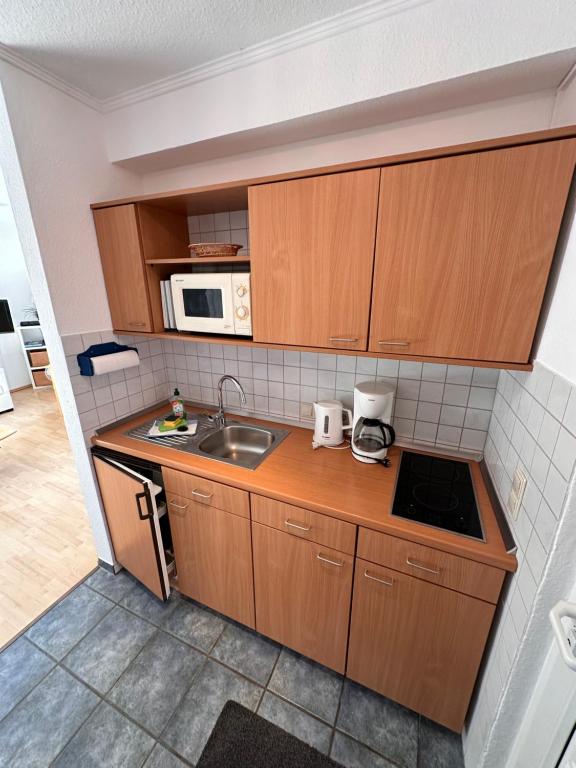 Kuchyň nebo kuchyňský kout v ubytování Hotel-Pension Haus Hubertus