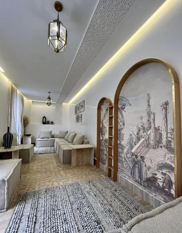 Postel nebo postele na pokoji v ubytování RIAD DAR BAYANE
