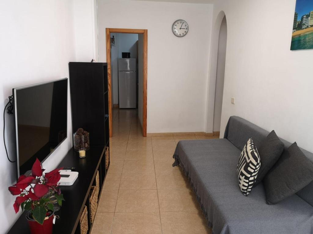 Televízia a/alebo spoločenská miestnosť v ubytovaní BKD1 - Apartamento entero a 50 metros PLAYA DE LAS CANTERAS