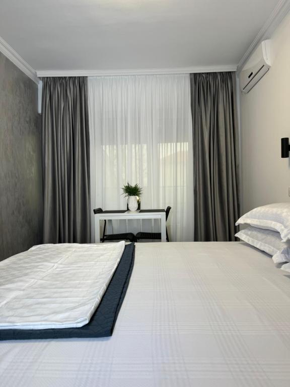 Letto o letti in una camera di Casa Ștefan