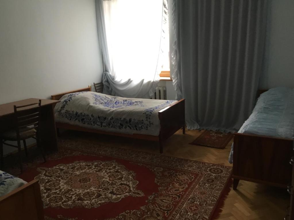 Postel nebo postele na pokoji v ubytování Luse Guest House