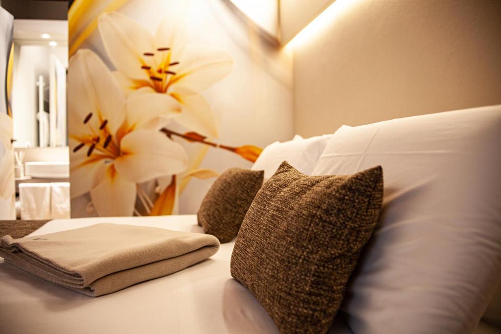 Posteľ alebo postele v izbe v ubytovaní Resort Villa Paola