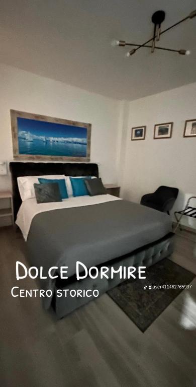 Postel nebo postele na pokoji v ubytování Dolce Dormire
