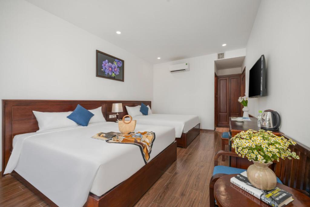 TV/trung tâm giải trí tại Sea Near Me Hotel Danang