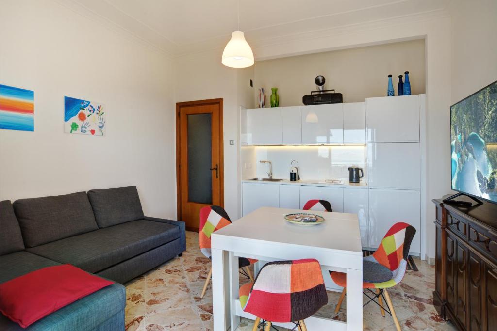 A kitchen or kitchenette at Top Floor Aparthotel Bentivoglio