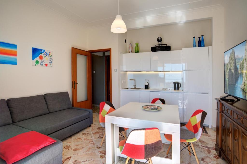 A kitchen or kitchenette at Top Floor Aparthotel Bentivoglio