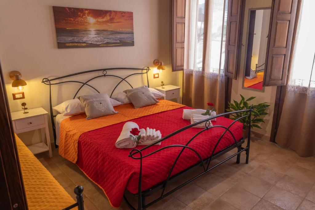 Postel nebo postele na pokoji v ubytování B&B Città Regia