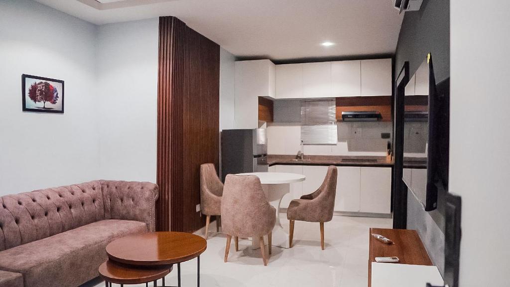 Kuchyň nebo kuchyňský kout v ubytování Cedarwood Apartments