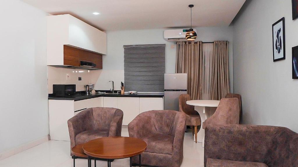 Kuchyň nebo kuchyňský kout v ubytování Cedarwood Apartments