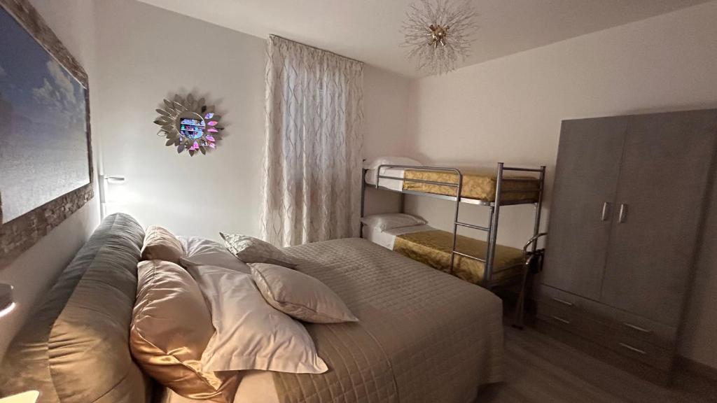 Postel nebo postele na pokoji v ubytování Dolce Dormire
