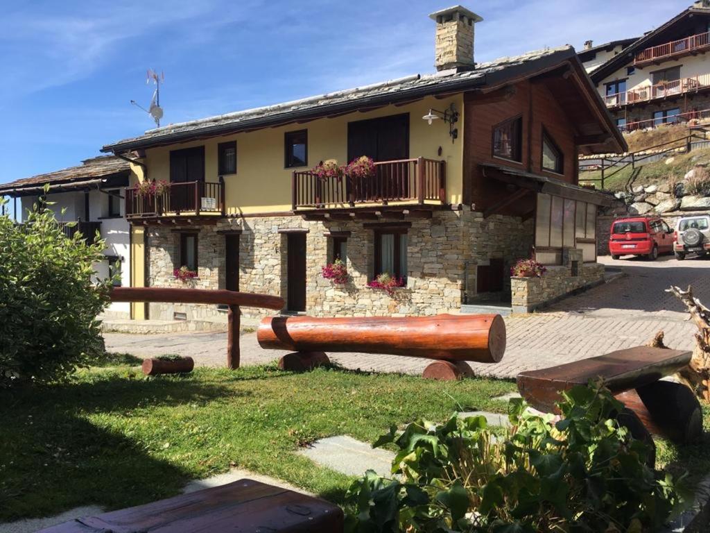a building with a large pipe in front of it at BAITA ARIANNA TRILOCALE SISES in Sestriere