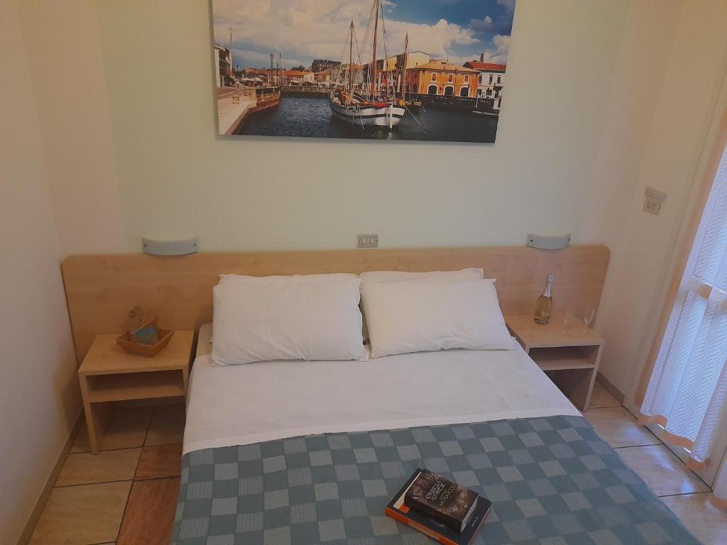 Postel nebo postele na pokoji v ubytování Hotel Antony