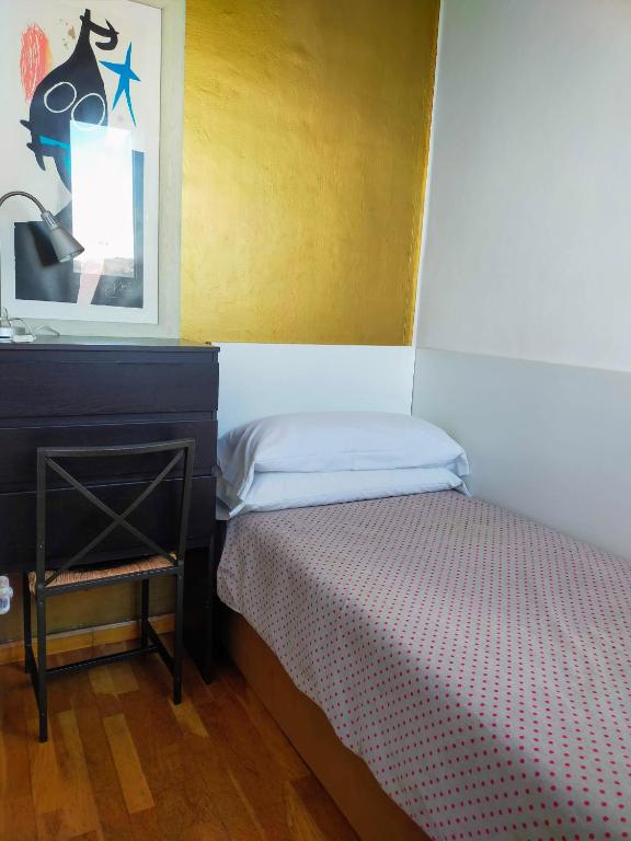 Ein Bett oder Betten in einem Zimmer der Unterkunft Barceloneta Port Ramblas