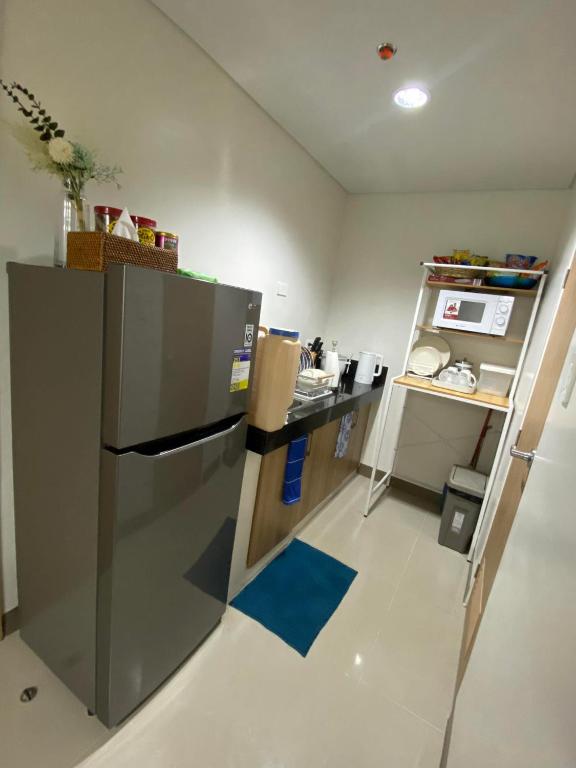 Kuchyň nebo kuchyňský kout v ubytování Casa Herminia at Bloom Residences 2Br