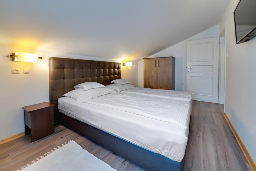 Postel nebo postele na pokoji v ubytování Bed & Breakfast Došen II