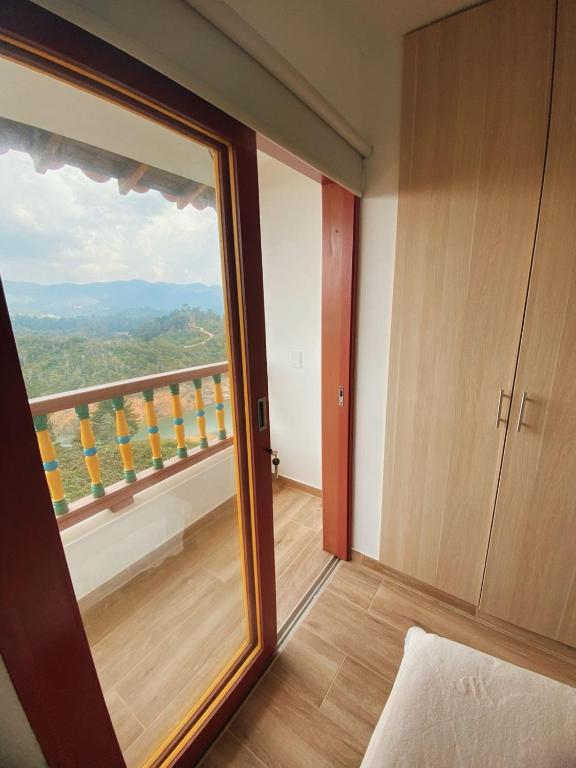 Balkón nebo terasa v ubytování Loma Rent Home Guatape