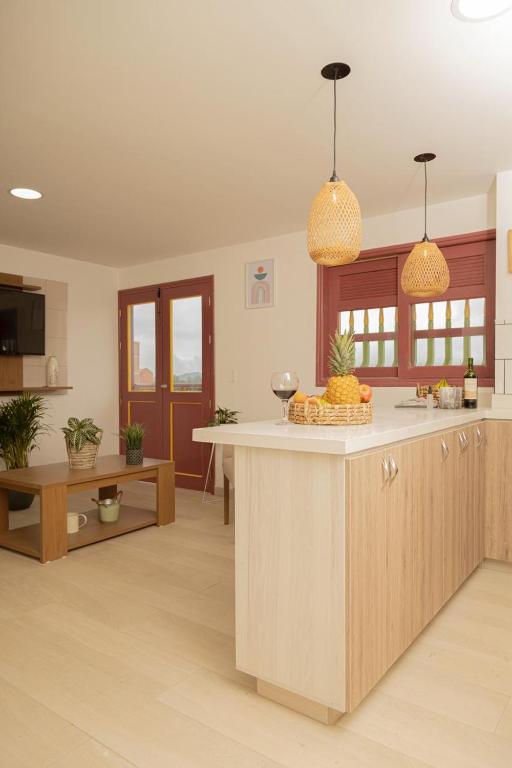 Kuchyň nebo kuchyňský kout v ubytování Loma Rent Home Guatape