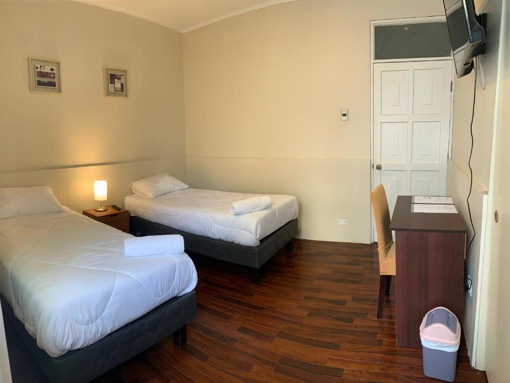 Postel nebo postele na pokoji v ubytování Península Hostel