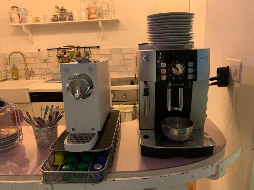 a coffee maker sitting on a counter in a kitchen at Bed and Breakfast 57 in Asuel